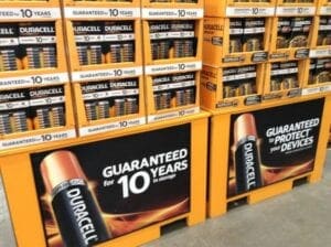 A display of batteries for sale in a store.