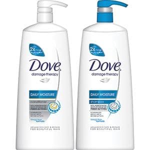 A bottle of dove body lotion and a pump.