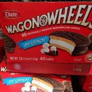 A box of wagon wheel cookies on top of a shelf.