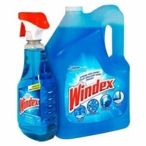 A bottle of windex and a spray can.