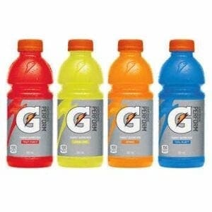 A group of four gatorade bottles in different colors.