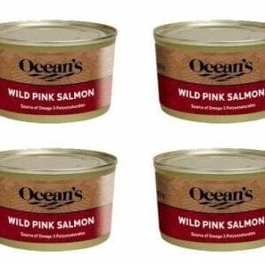 A group of four cans of ocean 's wild pink salmon.