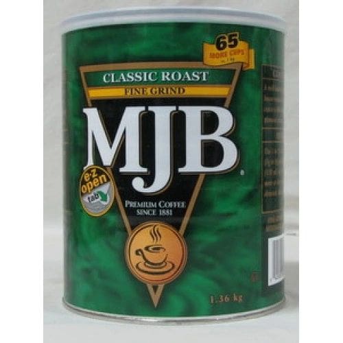 A can of coffee is shown with the words " mjb classic roast " on it.