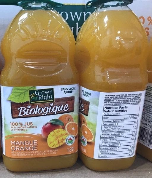 A close up of two bottles of juice