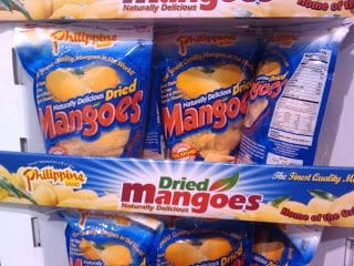 A shelf of dried mangoes in the store.