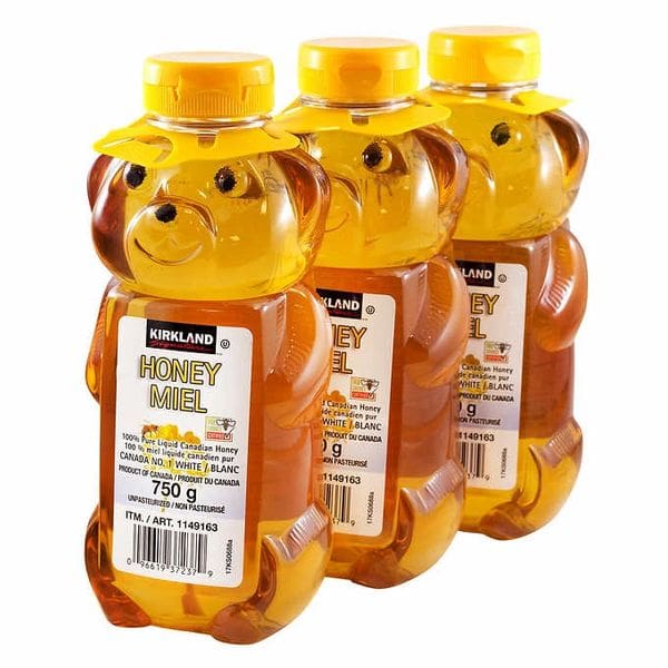 A group of three honey bears are shown.