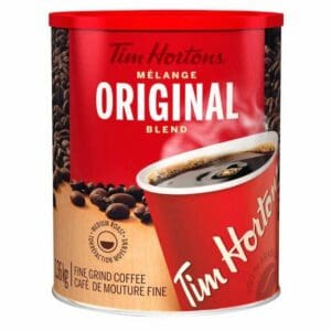 A can of coffee is shown with the lid off.