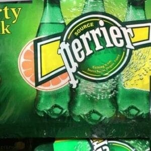 A close up of several bottles of perrier