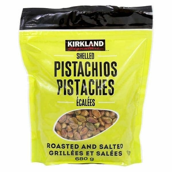 A bag of pistachios is shown on a white background.