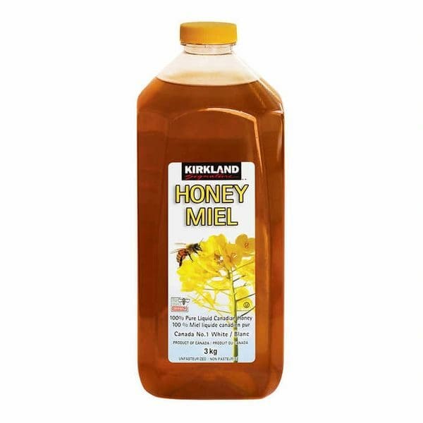 A bottle of honey is shown with the label.
