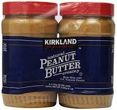 A couple of jars of peanut butter on top of each other.