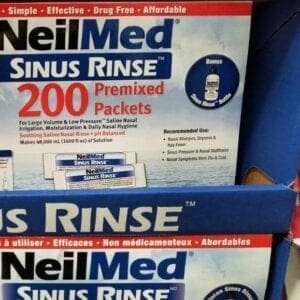 A box of neilmed sinus rinse on top of another box.