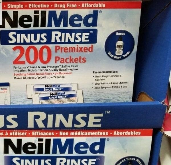 A box of neilmed sinus rinse on top of another box.