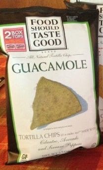 A package of tortilla chips that are labeled " taste good guacamole ".