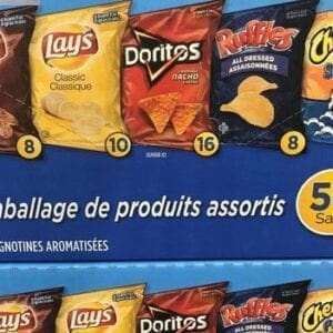 A blue sign with different types of potato chips.