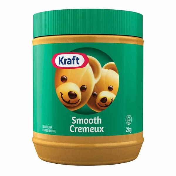 A jar of peanut butter with two bears on it.