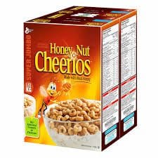 A box of honey nut cheerios cereal.
