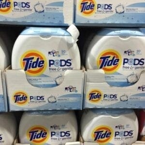 A display of tide pods in boxes on the shelves.