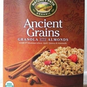 A box of granola with almonds and cinnamon sticks.