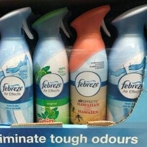 A display case with four different bottles of febreze.