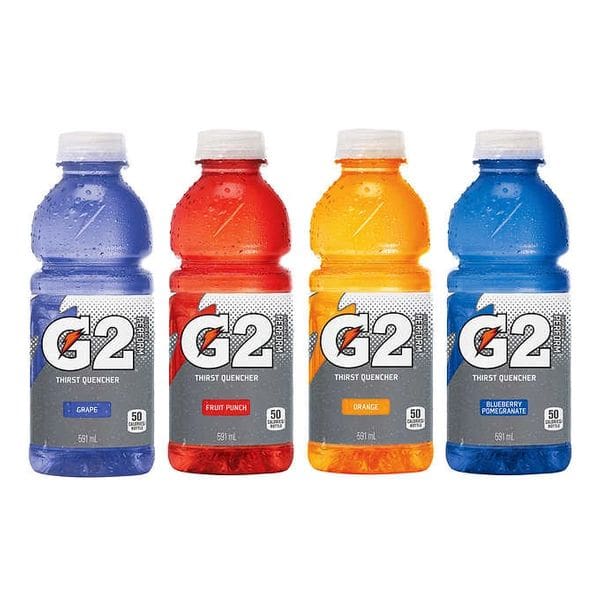 A group of four bottles of gatorade.
