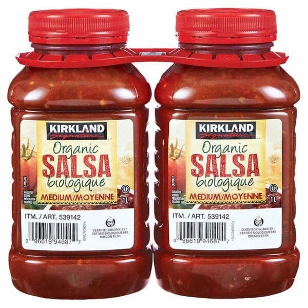 A couple of jars of salsa on top of each other.