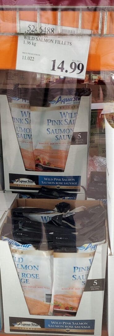 A box of salmon in a bag on the counter.