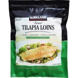 A bag of tilapia loins on top of a table.