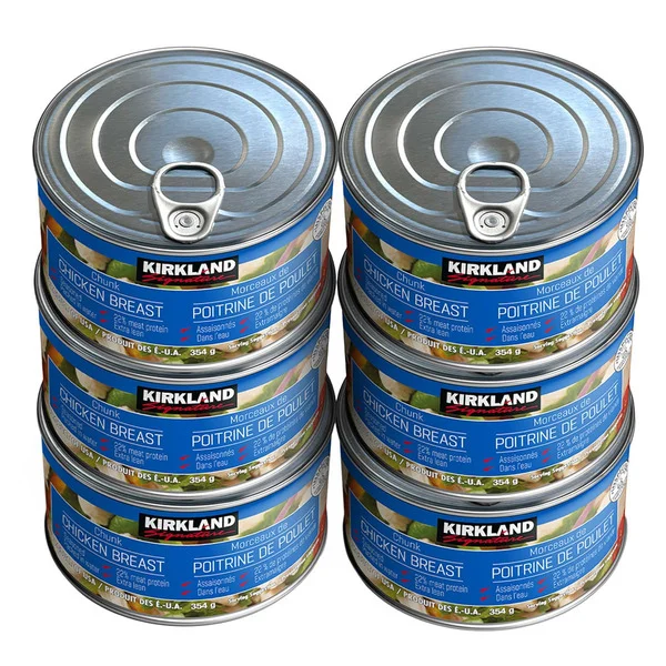 A stack of four cans of Kirkland Signature Canned Chicken Breast.