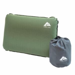 An Ozark Trail Camping Self Inflating Pillow with a bag on top.