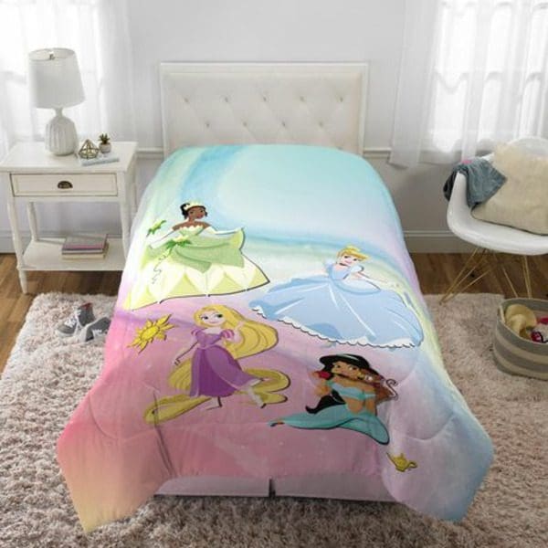 A bed with Disney "My Own Hero" Comforter on it.