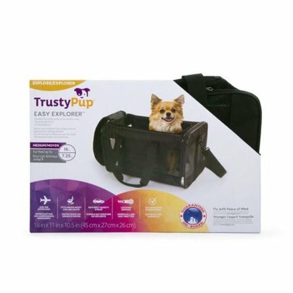 A dog is sitting in a TrustyPup Easy Explorer Pet Carrier.