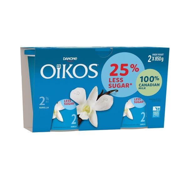 A box of Oikos 2% Vanilla Greek Yogurt With 25% Less Sugar with a flower on it.