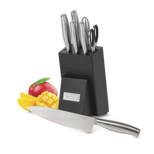 A black Cuisinart SSNC-8C 8-Piece Block Nitrogen Infused Stainless Steel Knife Set with a knife and fruit.