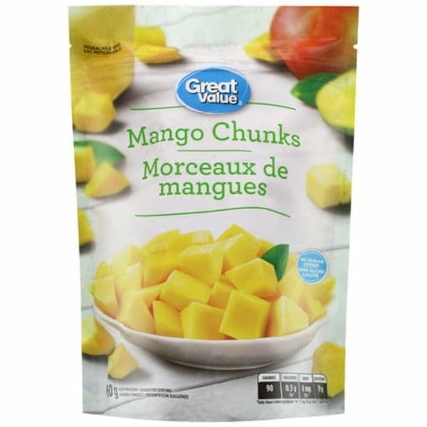 A bag of Great Value Frozen Mango Chunks on a white plate.