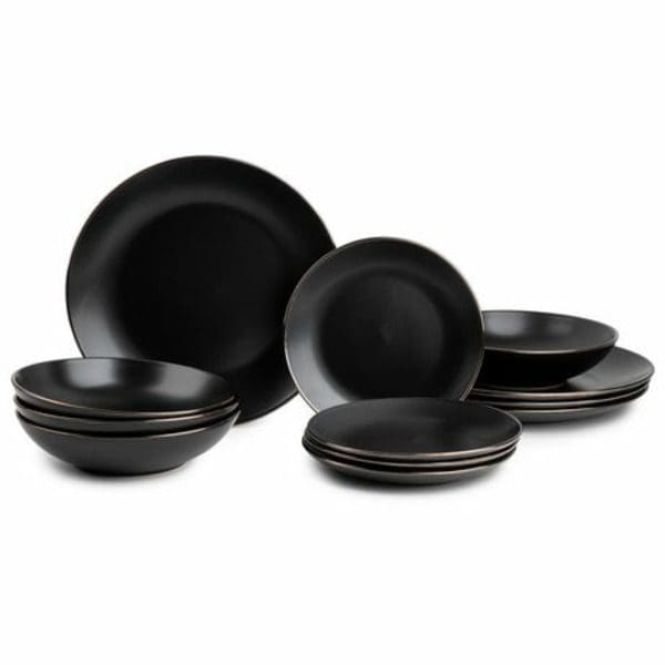 A Thyme&Table Dinnerware Set Onyx of black plates and bowls on a white background.