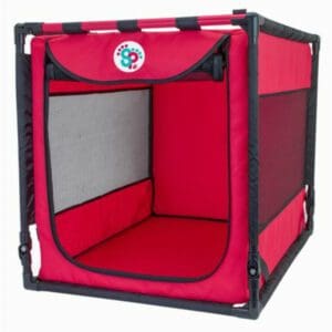 A red and black Sport Pet 36" Portable Kennel- Indoor & Outdoor Crate for Pets with a door.