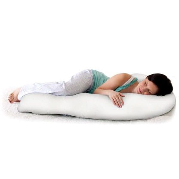 A woman laying on top of a Jolly Jumper Mama Sleep EZ Body Pillow.