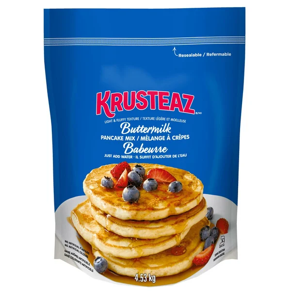 Krusteaz Buttermilk Complete Pancake Mix with blueberries and bananas.